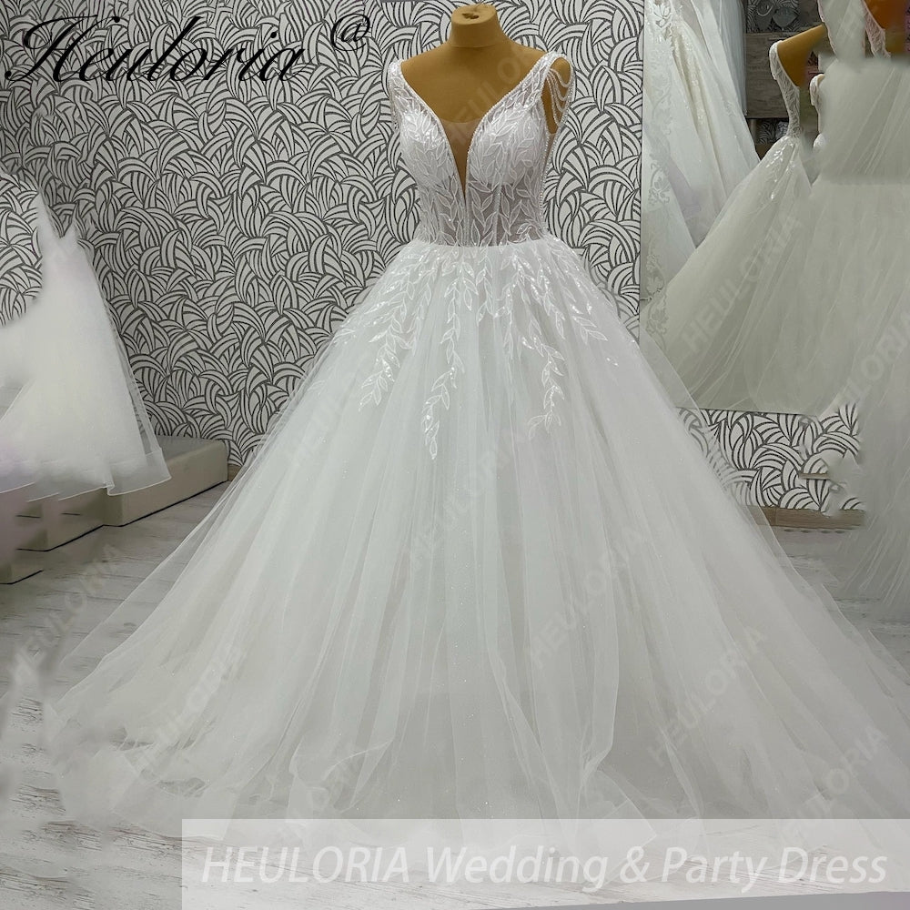 HEULORIA Sparkling Leaf Lace Ball Gown Wedding Dress with Plunging V-Neck and Beaded Fringe Sleeves AL-1025
