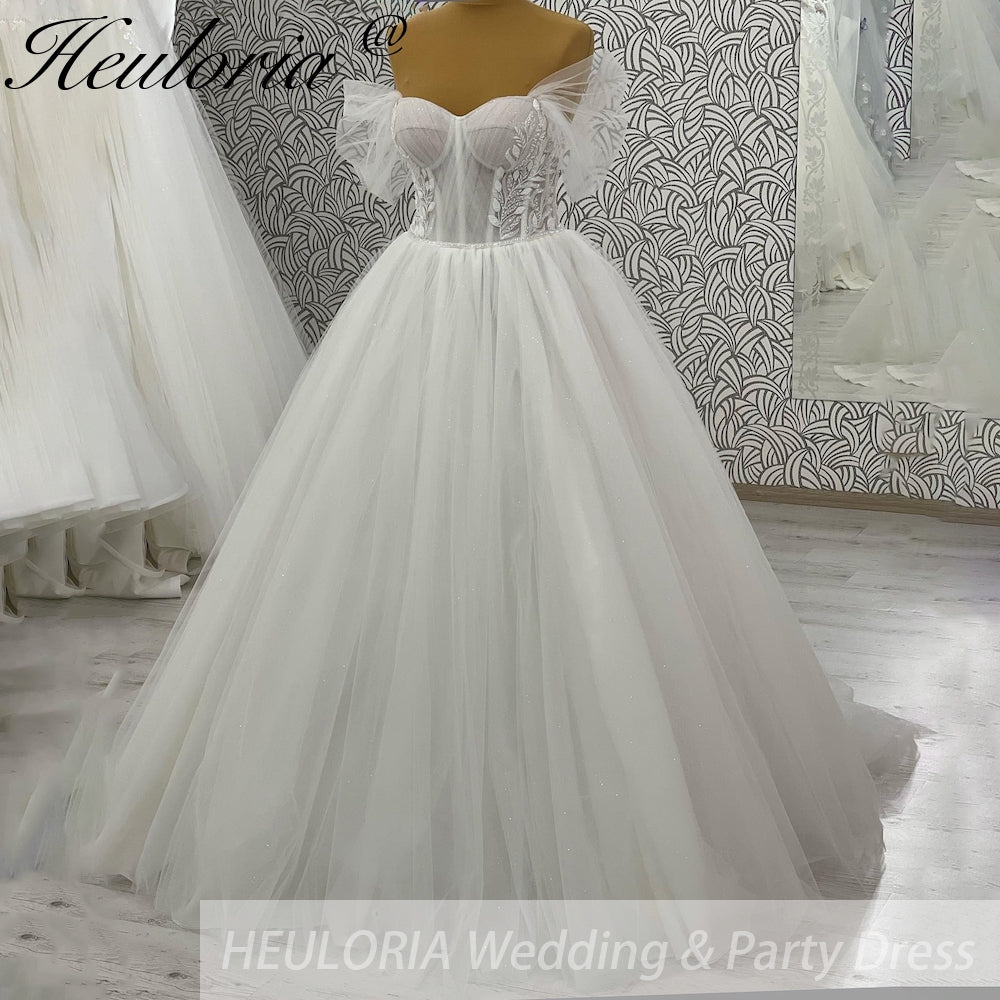 HEULORIA elegant A line wedding dress off shoulder Sparkly Glitter lace bridal dress long sleeve Robe De Mariee Wedding Bride Dress long train AL-1035