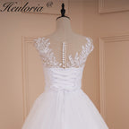 Heuloria Romantic Lace A-Line Wedding Dress with Illusion Neckline and Delicate Cap Sleeves AL-526