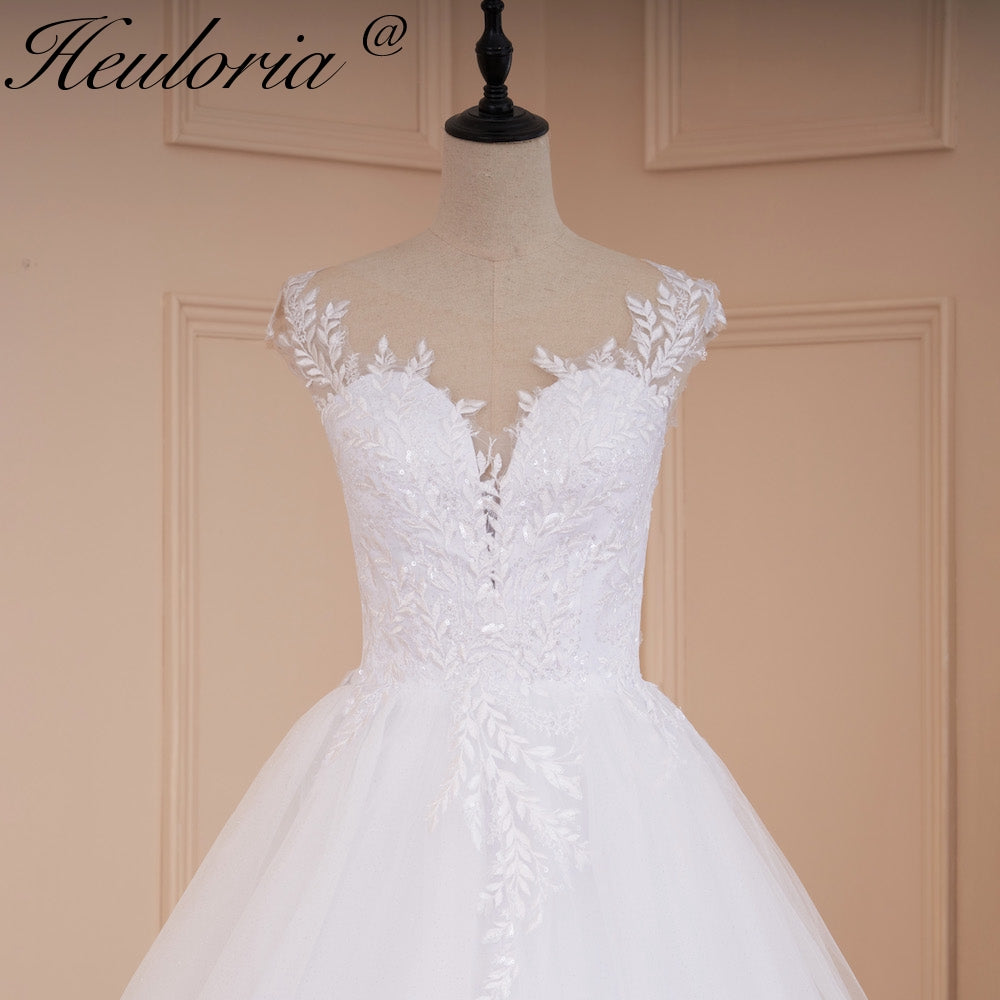 Heuloria Romantic Lace A-Line Wedding Dress with Illusion Neckline and Delicate Cap Sleeves AL-526