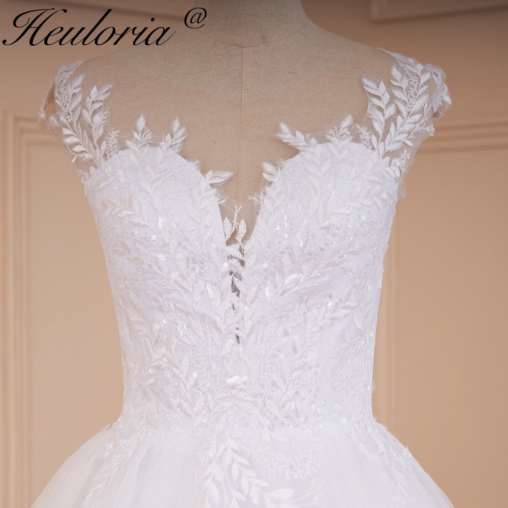 Heuloria Romantic Lace A-Line Wedding Dress with Illusion Neckline and Delicate Cap Sleeves AL-526
