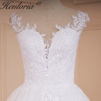 Heuloria Romantic Lace A-Line Wedding Dress with Illusion Neckline and Delicate Cap Sleeves AL-526