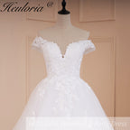 HEULORIA Plunging V-Neck Off-the-Shoulder Lace Wedding Dress with Illusion Back & Scalloped Train BA-546