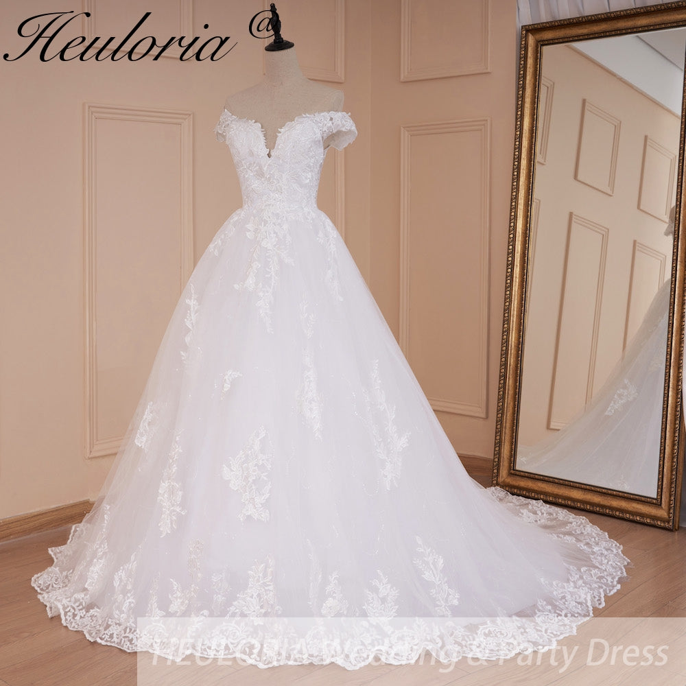 HEULORIA Plunging V-Neck Off-the-Shoulder Lace Wedding Dress with Illusion Back & Scalloped Train BA-546