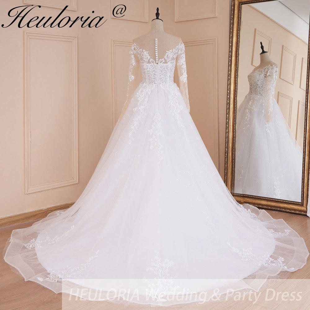 HEULORIA Illusion V-Neck Long Sleeve Lace Wedding Dress with 3D Floral Appliques & Shimmering A-Line Skirt AL-559 plus