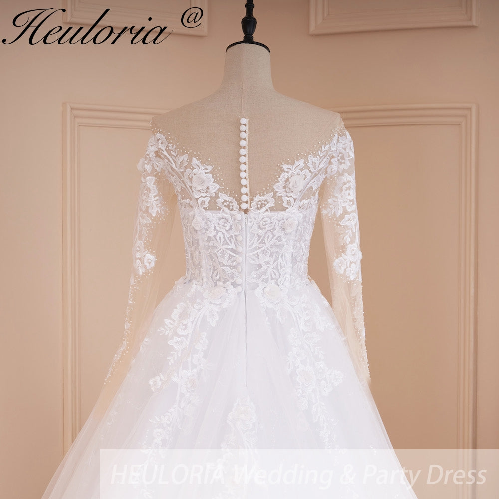 HEULORIA Illusion V-Neck Long Sleeve Lace Wedding Dress with 3D Floral Appliques & Shimmering A-Line Skirt AL-559 plus