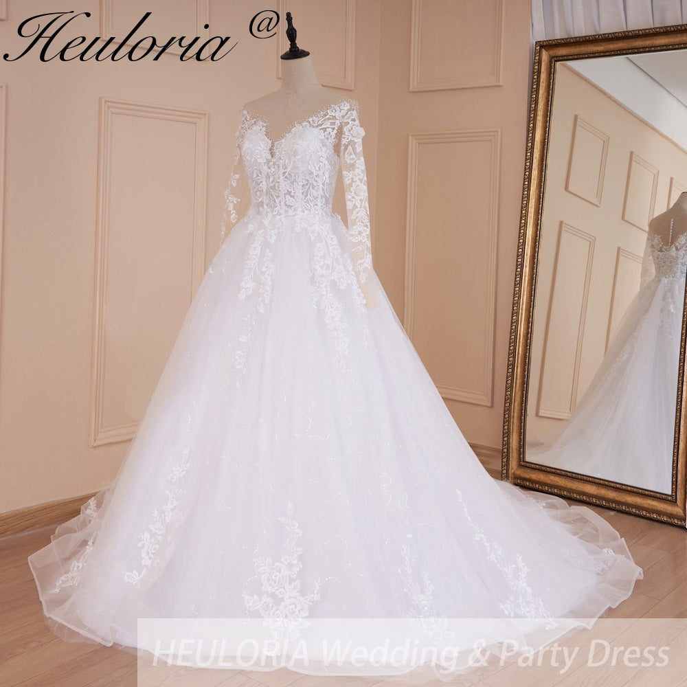 HEULORIA Illusion V-Neck Long Sleeve Lace Wedding Dress with 3D Floral Appliques & Shimmering A-Line Skirt AL-559 plus
