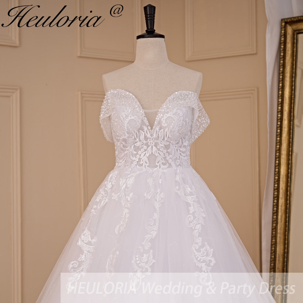 HEULORIA Sparkling Off-the-Shoulder Lace Ball Gown Wedding Dress - Plunging V-Neck & Cathedral Train BA-716A