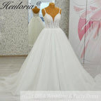 Heuloria Shimmering Starry Tulle Ballgown - Deep V-Neck & Leaf Lace Spaghetti Strap Wedding Dress AL-1095