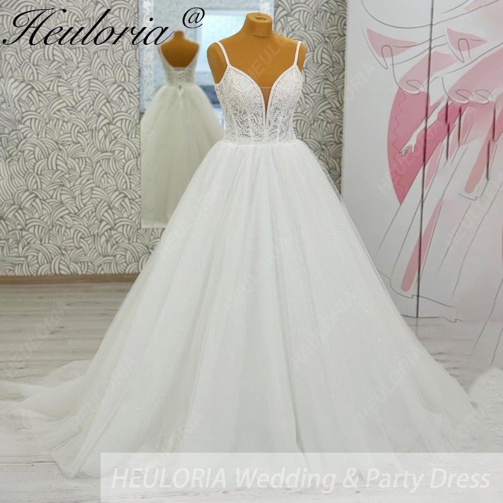 Heuloria Shimmering Starry Tulle Ballgown - Deep V-Neck & Leaf Lace Spaghetti Strap Wedding Dress AL-1095