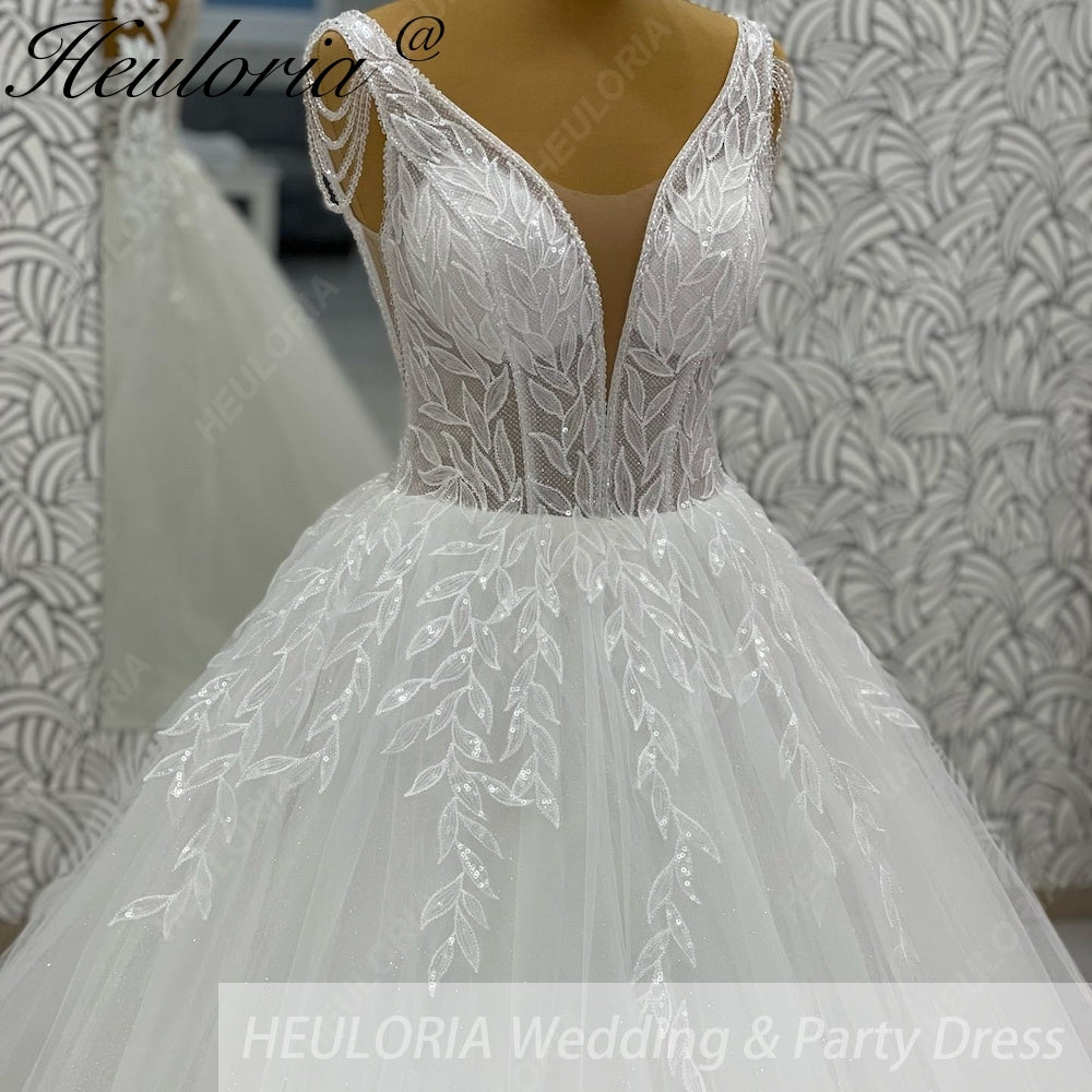 HEULORIA Sparkling Leaf Lace Ball Gown Wedding Dress with Plunging V-Neck and Beaded Fringe Sleeves AL-1025