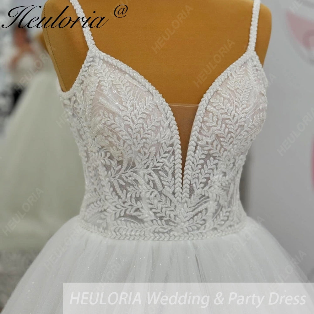 Heuloria Shimmering Starry Tulle Ballgown - Deep V-Neck & Leaf Lace Spaghetti Strap Wedding Dress AL-1095