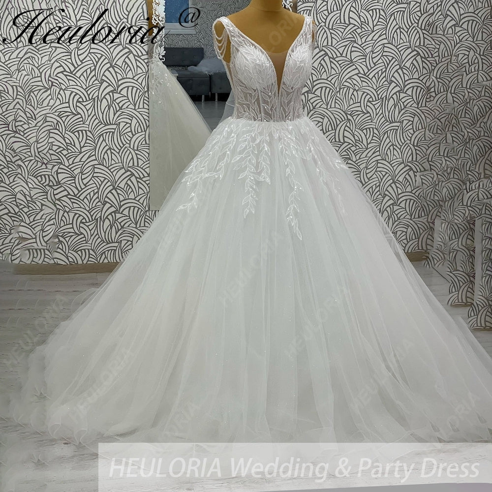 HEULORIA Sparkling Leaf Lace Ball Gown Wedding Dress with Plunging V-Neck and Beaded Fringe Sleeves AL-1025