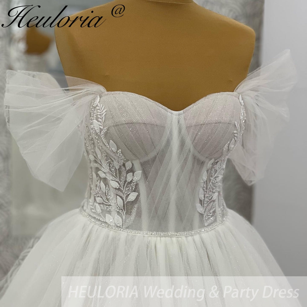 HEULORIA elegant A line wedding dress off shoulder Sparkly Glitter lace bridal dress long sleeve Robe De Mariee Wedding Bride Dress long train AL-1035
