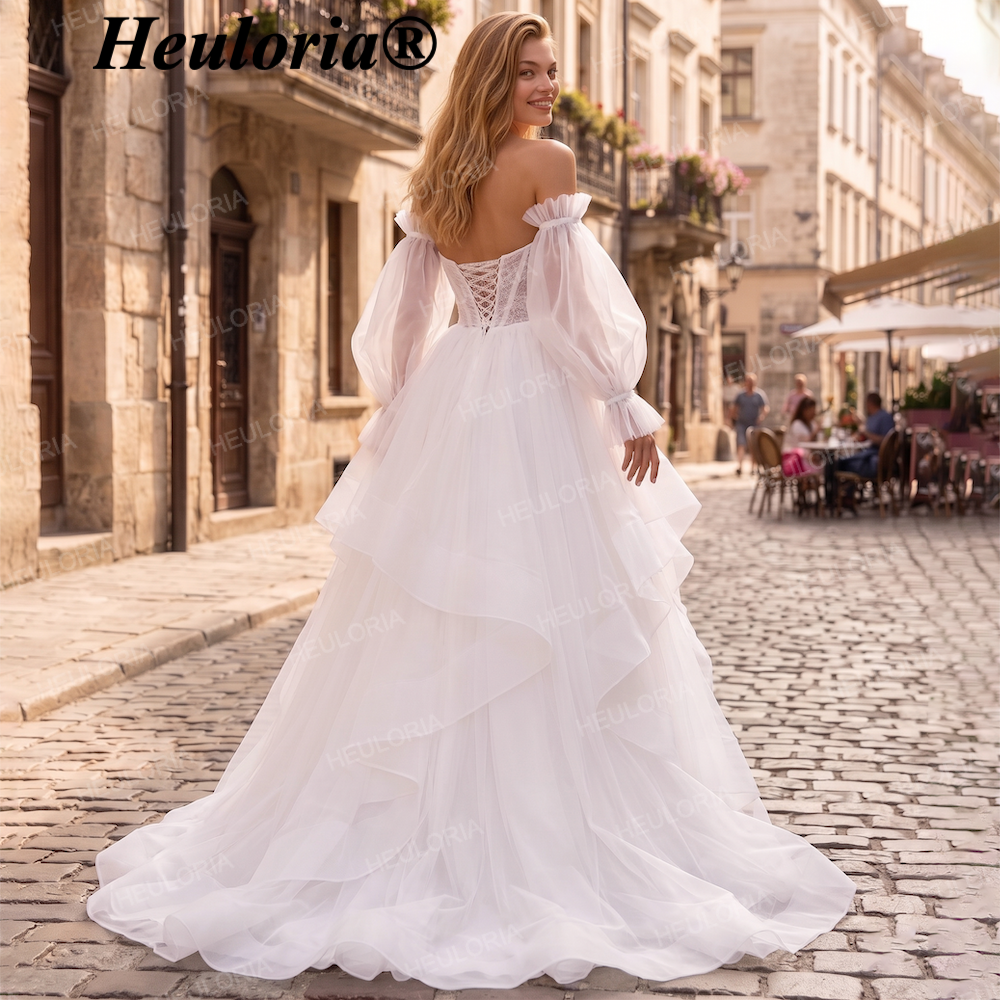 HEULORIA Romantic Off-the-Shoulder Tulle A-Line Wedding Dress with Puff Sleeves & Tiered Skirt AL-QK209