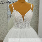 Heuloria Shimmering Starry Tulle Ballgown - Deep V-Neck & Leaf Lace Spaghetti Strap Wedding Dress AL-1095