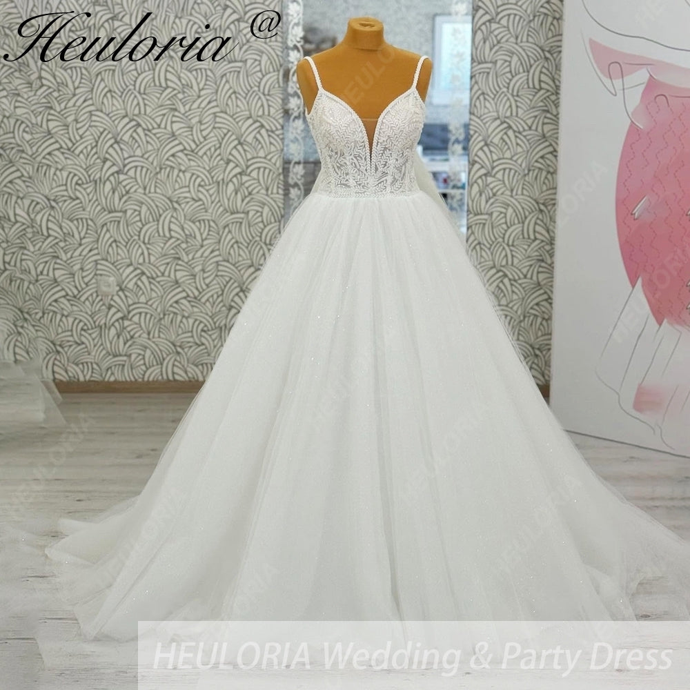 Heuloria Shimmering Starry Tulle Ballgown - Deep V-Neck & Leaf Lace Spaghetti Strap Wedding Dress AL-1095