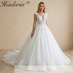 HEULORIA Enchanted Radiance: Plunging Illusion V-Neck Ball Gown Wedding Dress with Delicate Cap Sleeves BA-1075