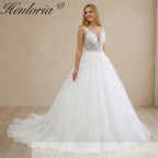 HEULORIA Sparkling Leaf Lace Ball Gown Wedding Dress with Plunging V-Neck and Beaded Fringe Sleeves AL-1025