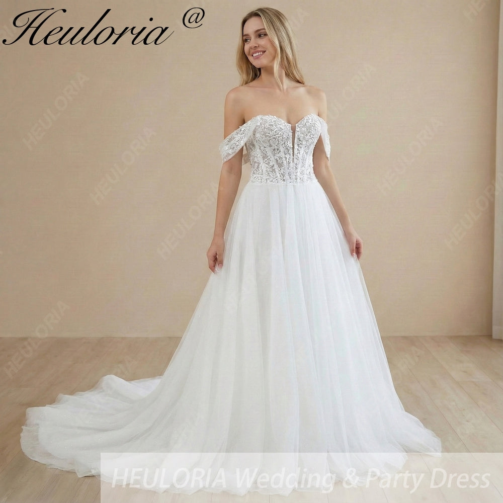Heuloria Sparkling Glitter Tulle A-Line Wedding Dress with Detachable Off-the-Shoulder Sleeves and Sheer Corset Bodice AL-1027 Main image