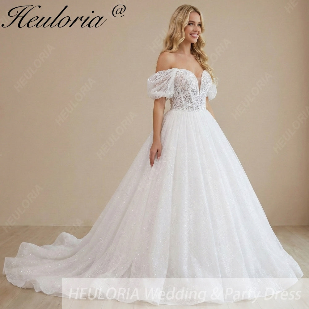 HEULORIA Enchanting Off-the-Shoulder Glitter Tulle Wedding Dress with Dramatic Puff Sleeves & Plunging Sweetheart Neckline BA-1062