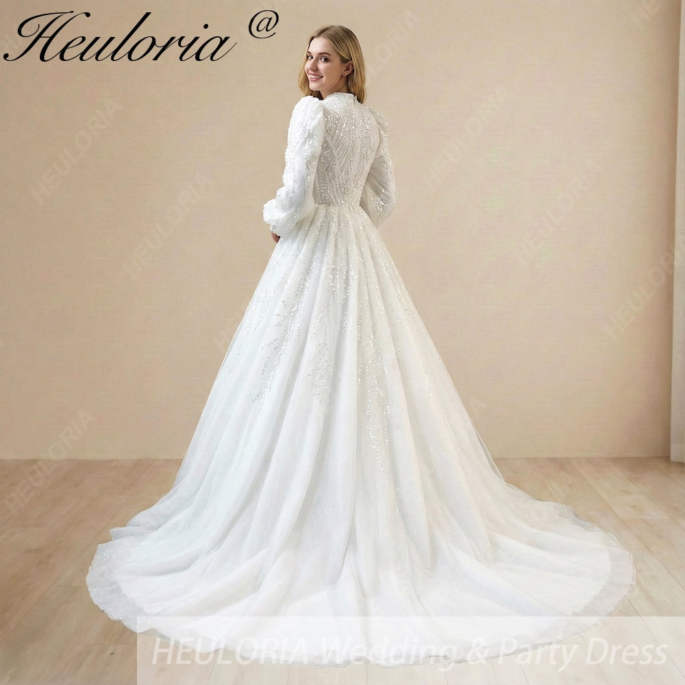 HEULORIA Regal High-Neck Beaded Wedding Dress: Sparkling Sequin A-Line Gown with Bishop Sleeves Muslim wedding dress  BA-1205 Image secondaire du produit
