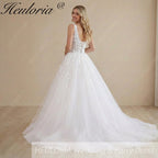 HEULORIA Illusion Deep V-Neck Floral Lace Ball Gown Wedding Dress with Glitter Tulle & Corset Back AL-1023