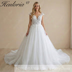 HEULORIA Ethereal Lace Appliqué Ball Gown: Illusion V-Neck & Scalloped Cap Sleeves BA-1090