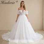 HEULORIA Enchanting Off-the-Shoulder Glitter Tulle Wedding Dress with Dramatic Puff Sleeves & Plunging Sweetheart Neckline BA-1062