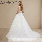 HEULORIA Enchanting Leaf Lace A-Line Wedding Dress - Shimmering Tulle & Plunging Illusion V-Neck AL-1010