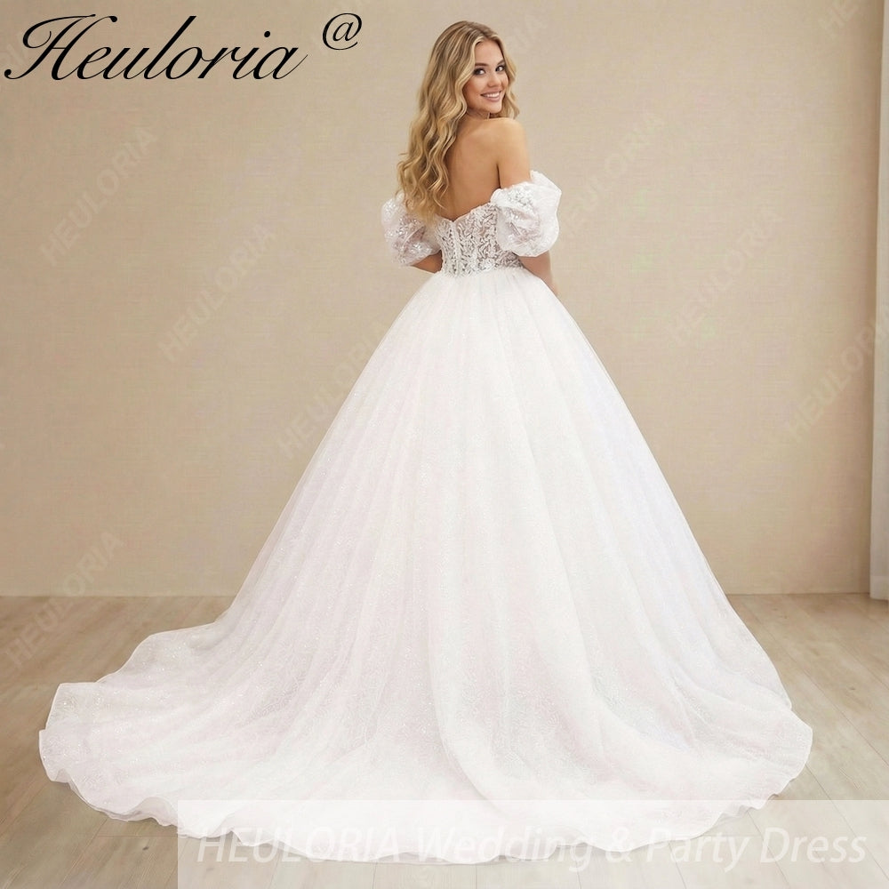 HEULORIA Enchanting Off-the-Shoulder Glitter Tulle Wedding Dress with Dramatic Puff Sleeves & Plunging Sweetheart Neckline BA-1062