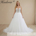 HEULORIA Ethereal Illusion Deep V-Neck Lace & Tulle Ballgown Wedding Dress with Shimmering Sequins AL-1044