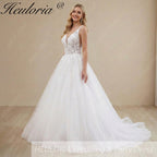 HEULORIA Illusion Deep V-Neck Floral Lace Ball Gown Wedding Dress with Glitter Tulle & Corset Back AL-1023