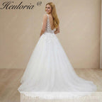 Heuloria Leafy Floral Lace V-Neck Wedding Dress: Shimmering Glitter Tulle A-Line Gown with Corset Back AL-970