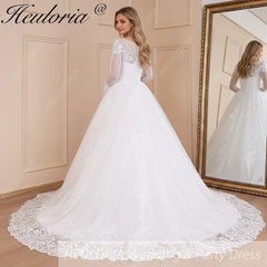 HEULORIA Ball-Gown/Princess Scoop Illusion long sleeve Cathedral Train Tulle Lace Wedding Dress With Sequins BA-574