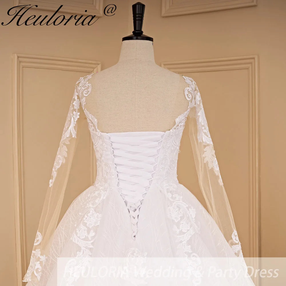 HEULORIA A-line long sleeve Court Train Lace Wedding Dress With Sequins AL-692