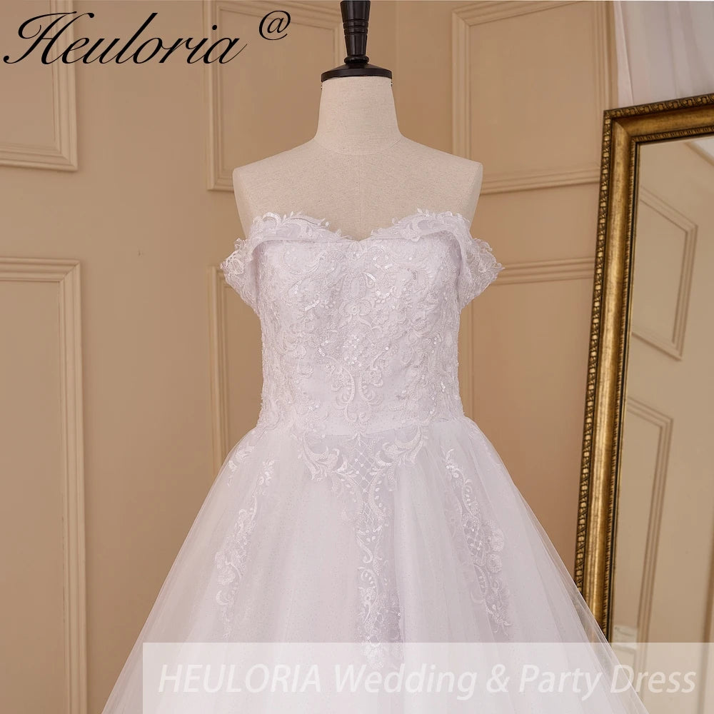 HEULORIA Romantic Off-the-Shoulder Lace Ball Gown Wedding Dress with Ruffled Sleeves and Cathedral Train BA-830
