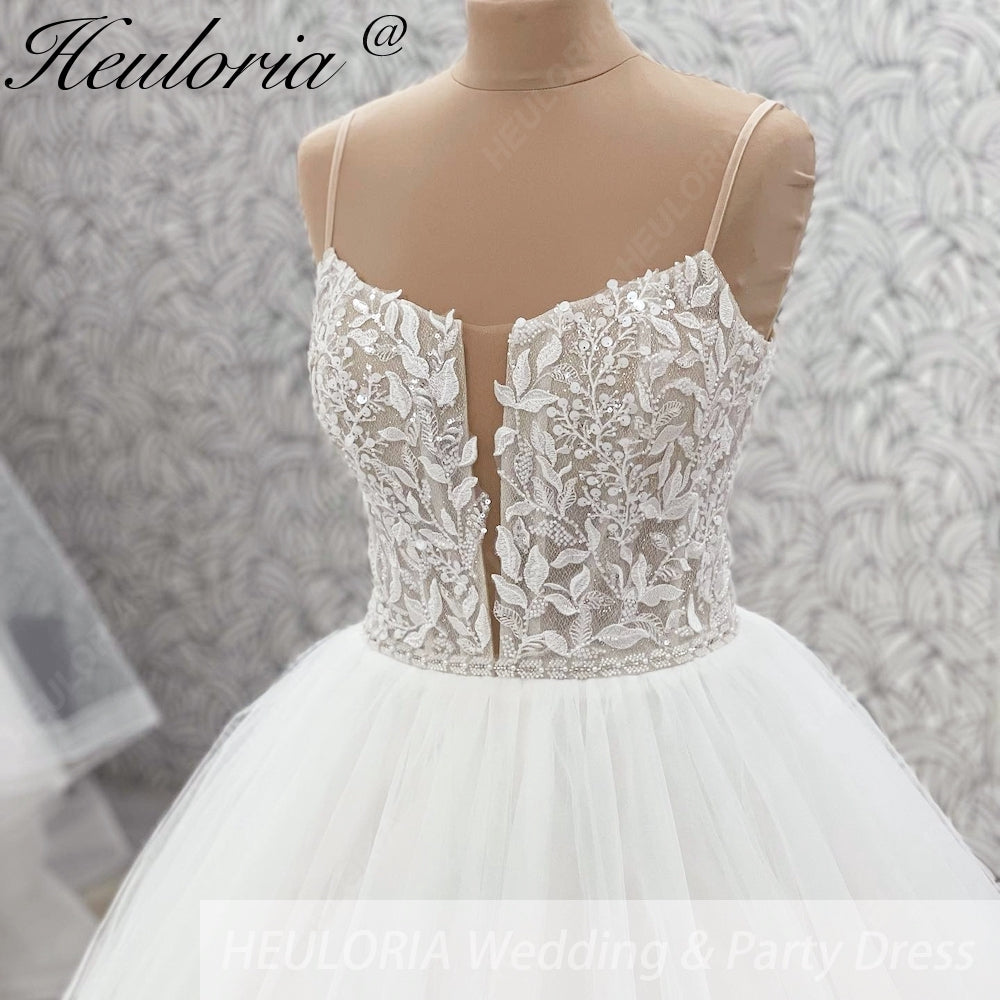 HEULORIA Ethereal Illusion Deep V-Neck Lace & Tulle Ballgown Wedding Dress with Shimmering Sequins AL-1044