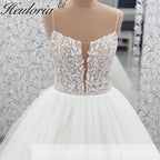 HEULORIA Ethereal Illusion Deep V-Neck Lace & Tulle Ballgown Wedding Dress with Shimmering Sequins AL-1044