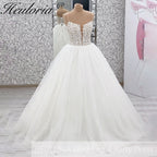 HEULORIA Ethereal Illusion Deep V-Neck Lace & Tulle Ballgown Wedding Dress with Shimmering Sequins AL-1044