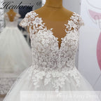HEULORIA 3D Floral Lace A-Line Wedding Dress with Illusion V-Neck & Romantic Cap Sleeves AL-1042