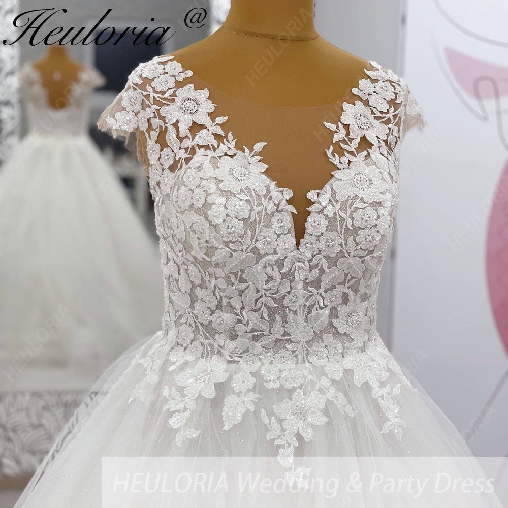 HEULORIA 3D Floral Lace A-Line Wedding Dress with Illusion V-Neck & Romantic Cap Sleeves AL-1042