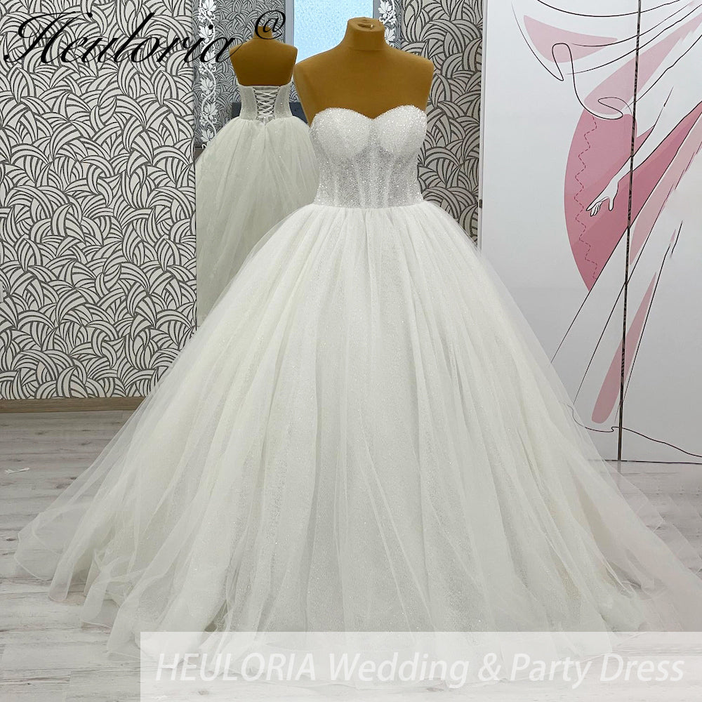 HEULORIA elegant Princess wedding dress sweetheart Sparkly Glitter lace bridal dress long sleeve Robe De Mariee Wedding Bride Dress long train BA-1040