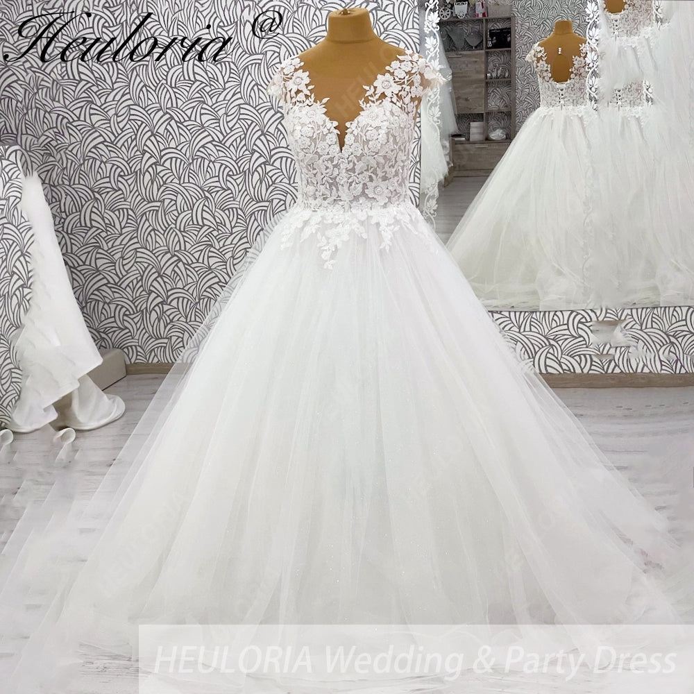 HEULORIA 3D Floral Lace A-Line Wedding Dress with Illusion V-Neck & Romantic Cap Sleeves AL-1042