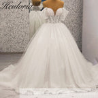 HEULORIA Enchanting Off-the-Shoulder Glitter Tulle Wedding Dress with Dramatic Puff Sleeves & Plunging Sweetheart Neckline BA-1062