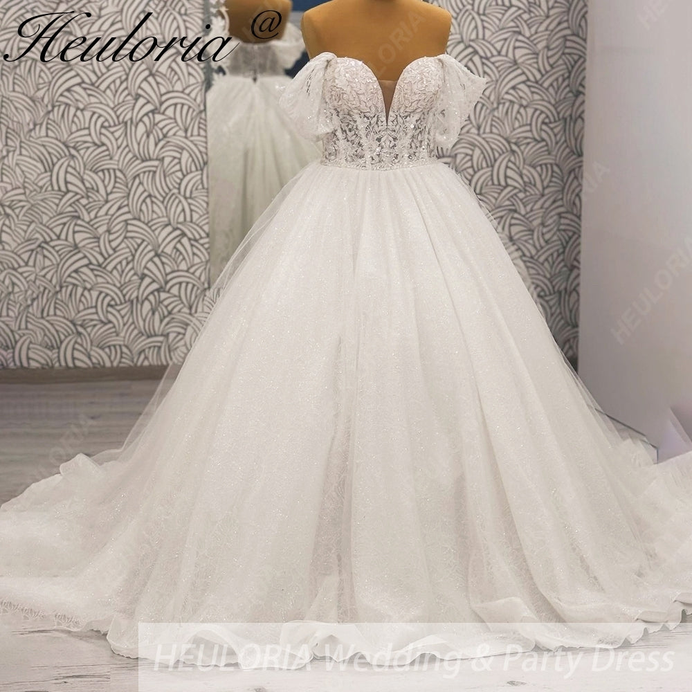 HEULORIA Enchanting Off-the-Shoulder Glitter Tulle Wedding Dress with Dramatic Puff Sleeves & Plunging Sweetheart Neckline BA-1062