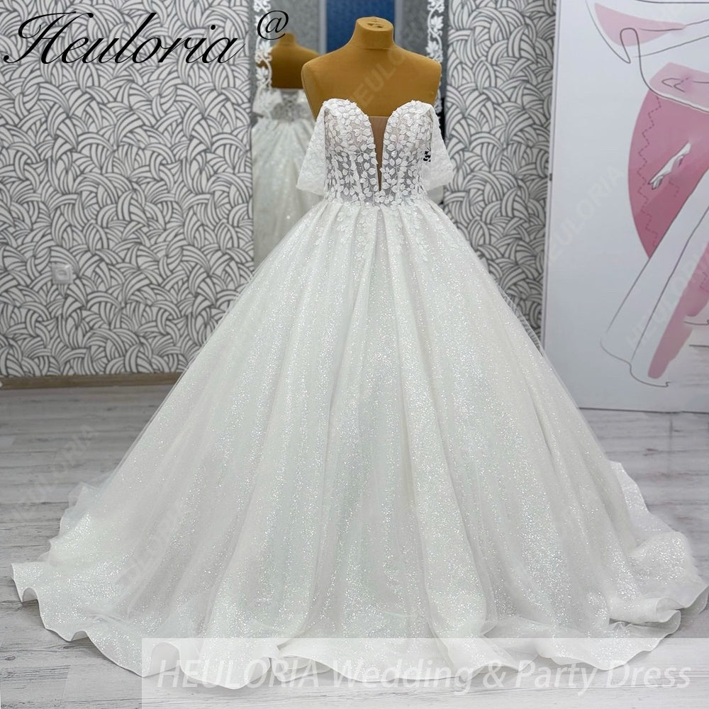 HEULORIA Ethereal Sparkle Tulle Ball Gown with Plunging Leafy Lace & Off-the-Shoulder Sleeves BA-1101