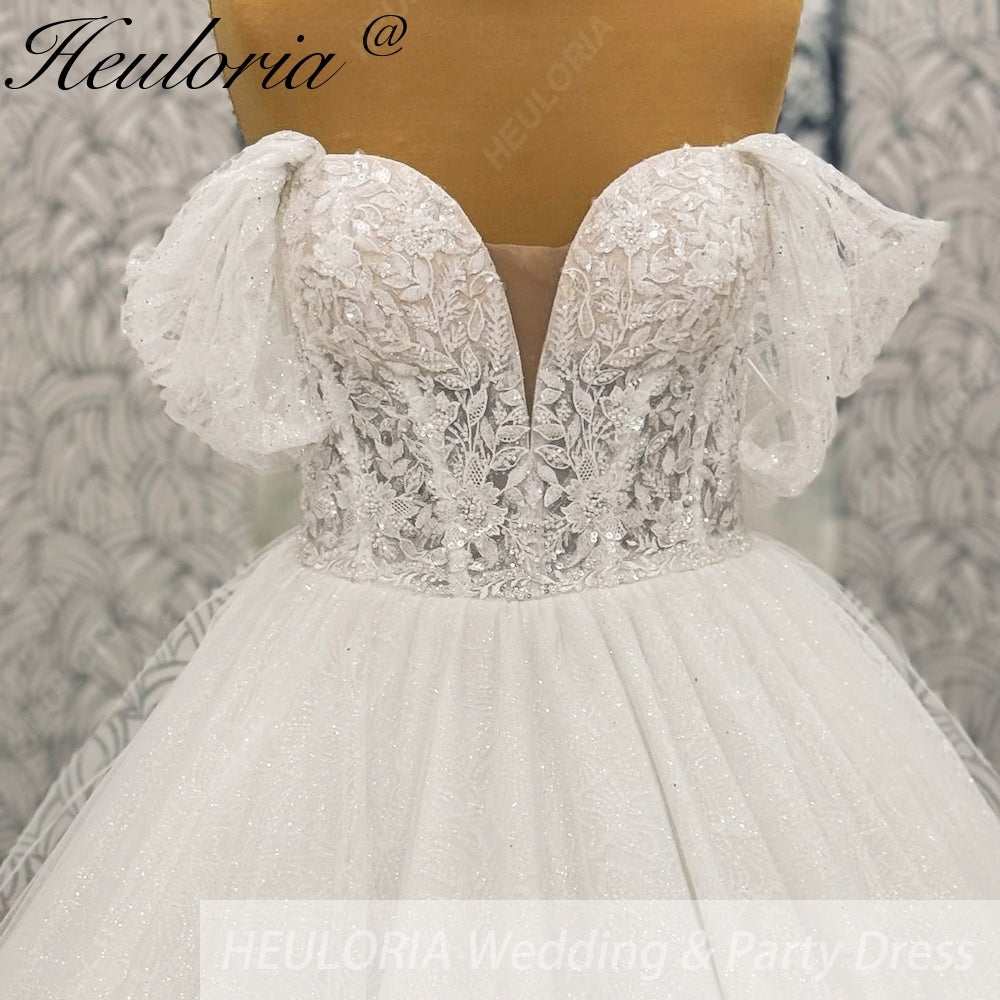 HEULORIA Enchanting Off-the-Shoulder Glitter Tulle Wedding Dress with Dramatic Puff Sleeves & Plunging Sweetheart Neckline BA-1062