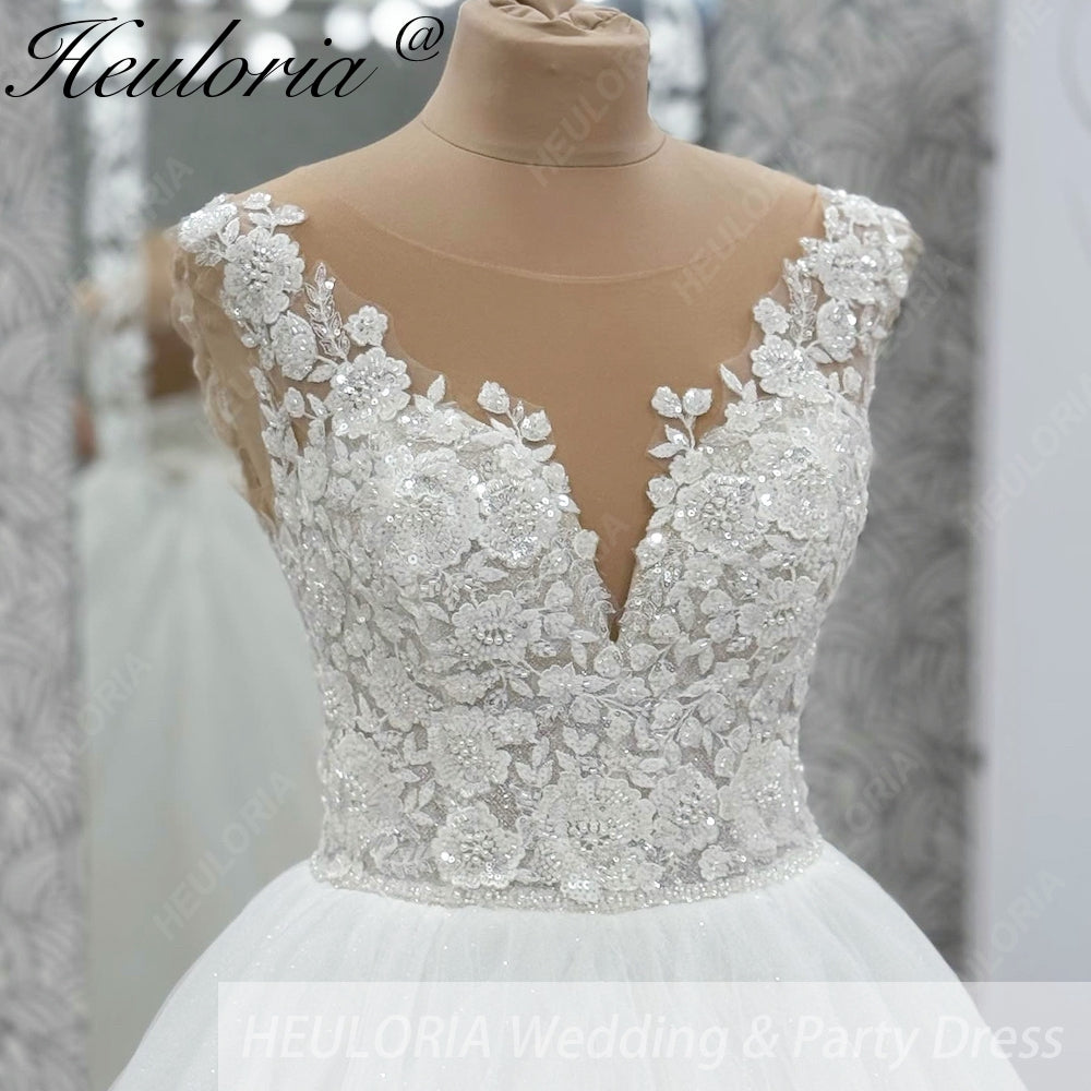 HEULORIA Shimmering Floral Lace Ball Gown Wedding Dress with Illusion V-Neck and Cathedral Train AL-1060