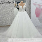 HEULORIA Shimmering Floral Lace Ball Gown Wedding Dress with Illusion V-Neck and Cathedral Train AL-1060